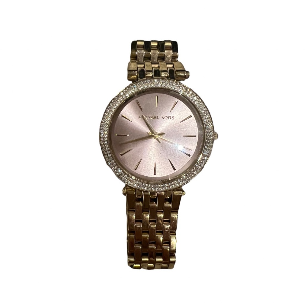 Michael Kors gold watch with diamonds around with light pink face
